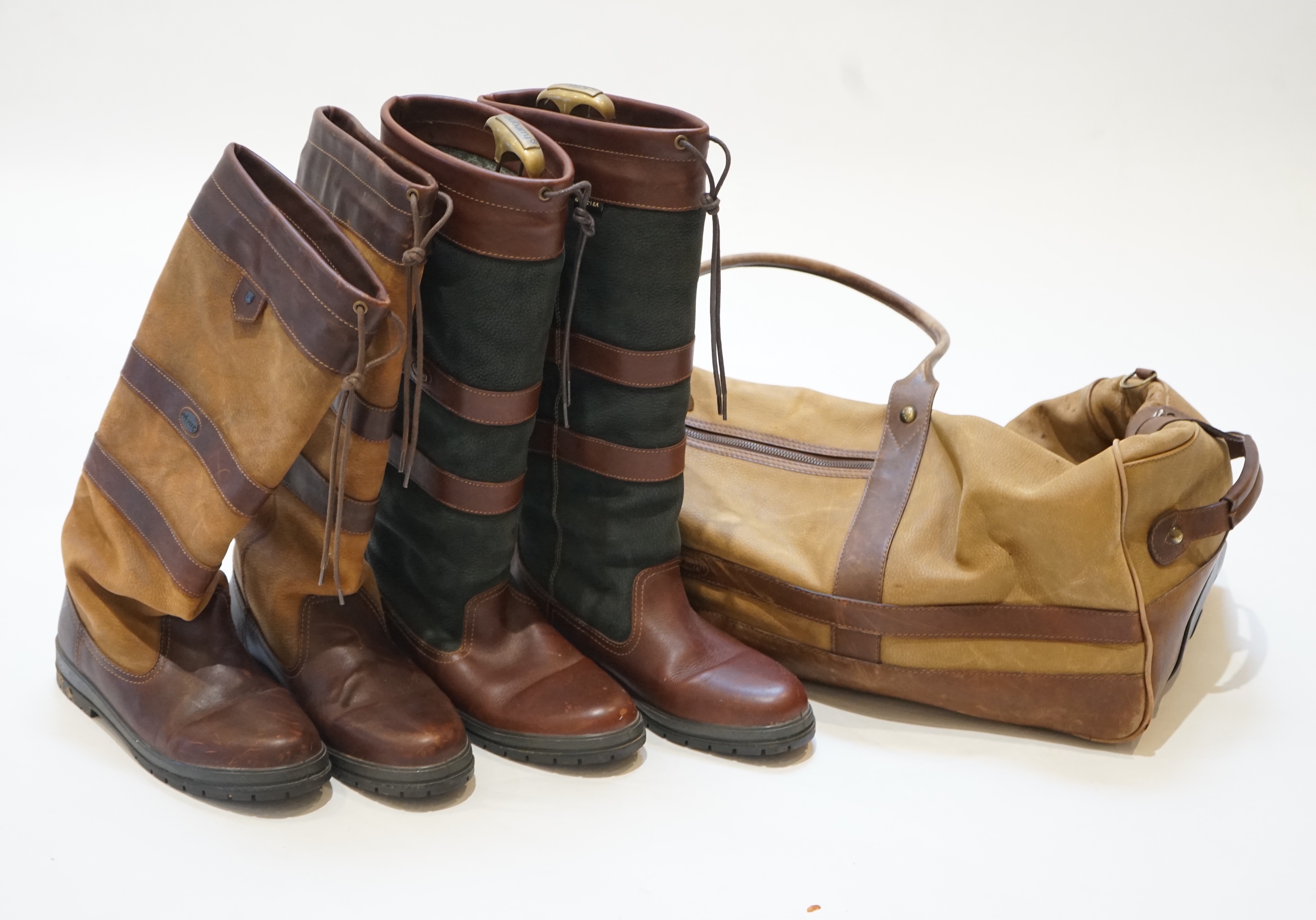 A large Dubarry leather travel bag and two pairs of gentleman's Dubarry brown leather boots, size 8.5/9